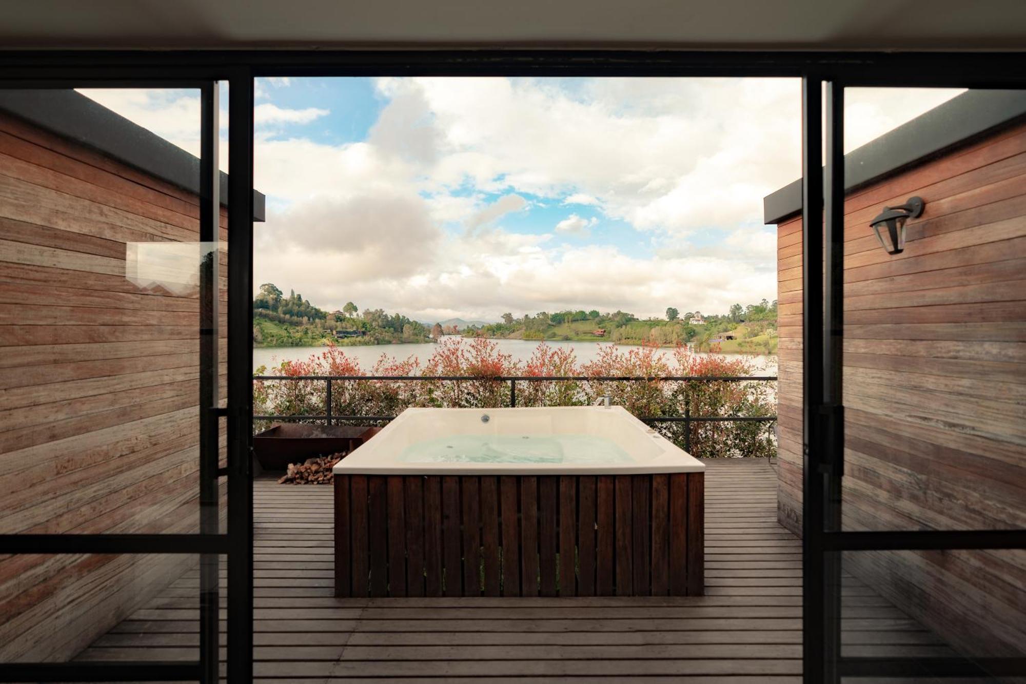 The Boato Hotel Guatape Exterior photo The view from the house